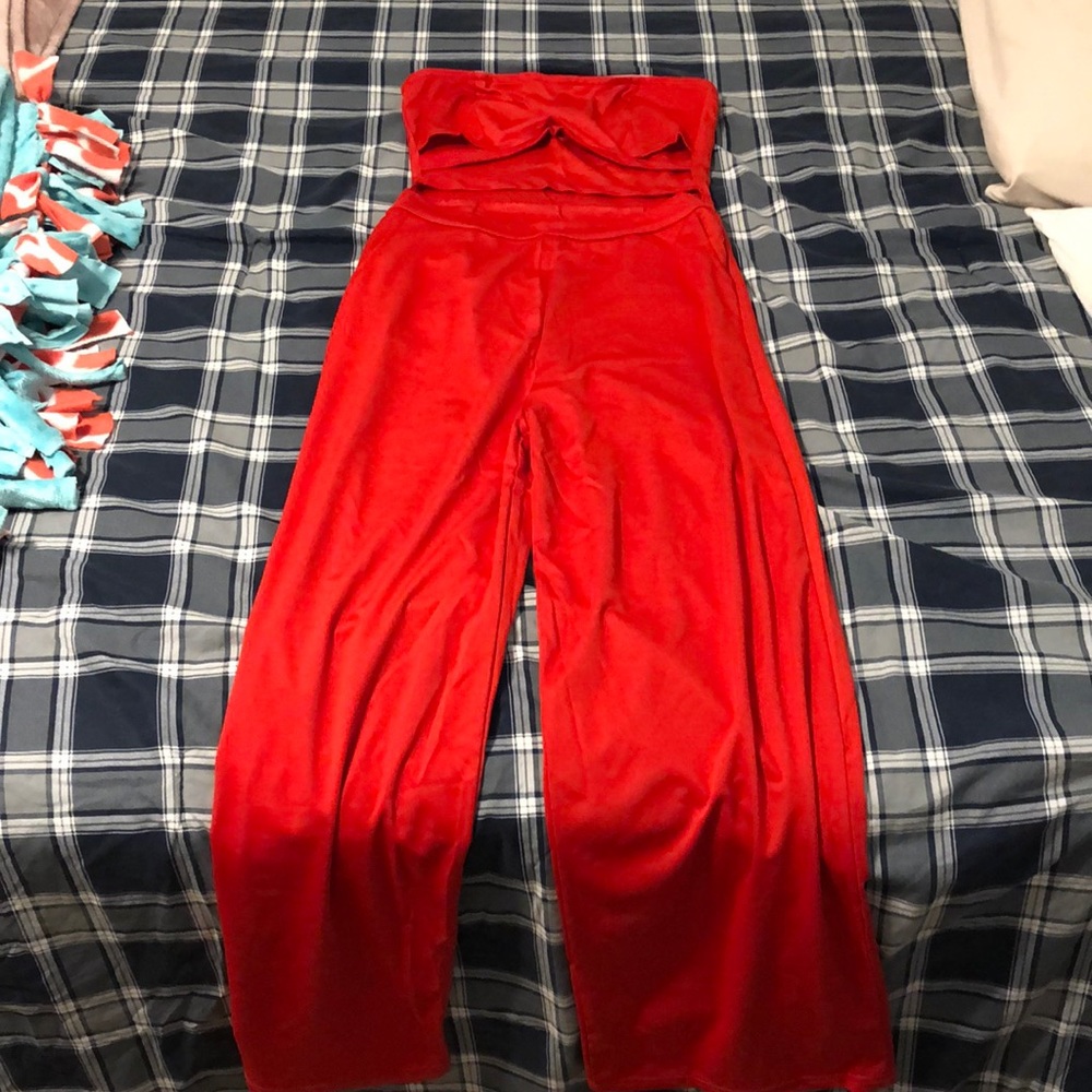 Red jump suit